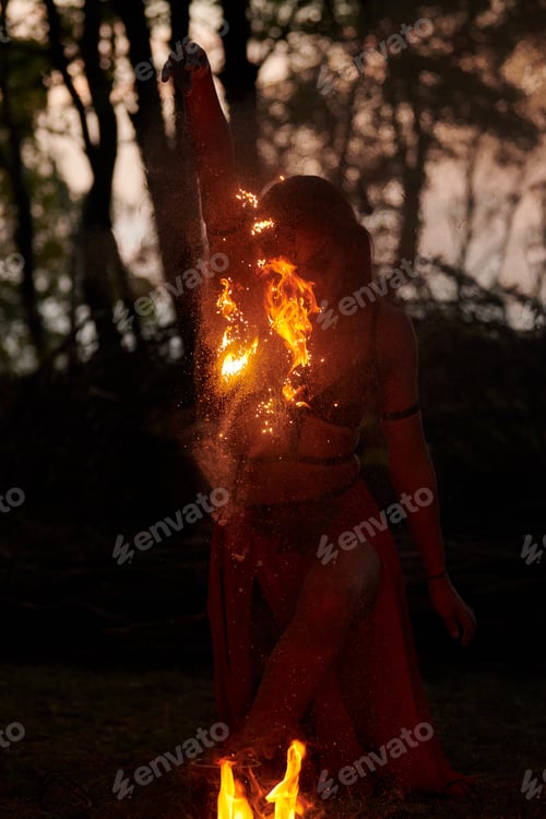 Preview: Girl fire dancing performance at outdoor art festival, smooth movements of female artist
