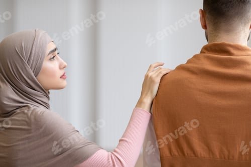 Preview: Unhappy Muslim Wife Touching Husband While He Ignoring Her Indoor