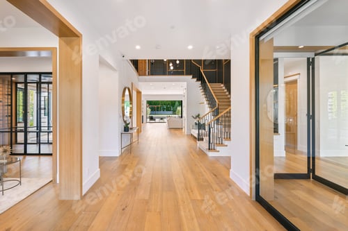 Preview: a house foyer features hardwood floors and modern staircases and wooden floors