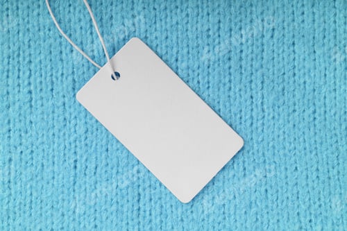 Preview: Template Of Blank Clothing Label, Price Tag On Turquoise Knitted Sweater Background