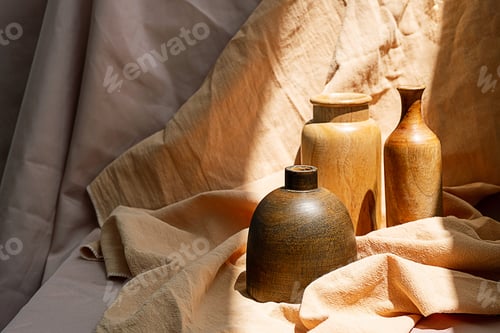 Preview: Aesthetic wooden vases on textile background. Vintage home decor collection.