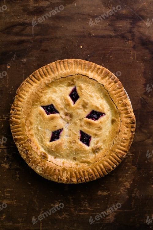 Preview: Rustic cherry pie with milk on wooden background, homemade dessert style