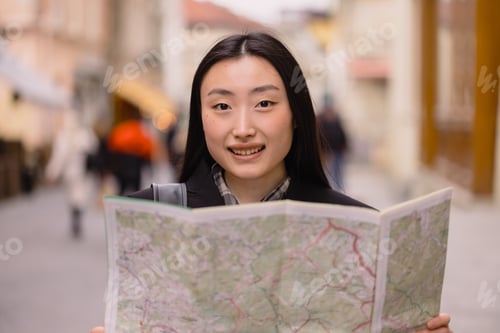 Preview: Asian woman tourist or business lady traveling in Europe.