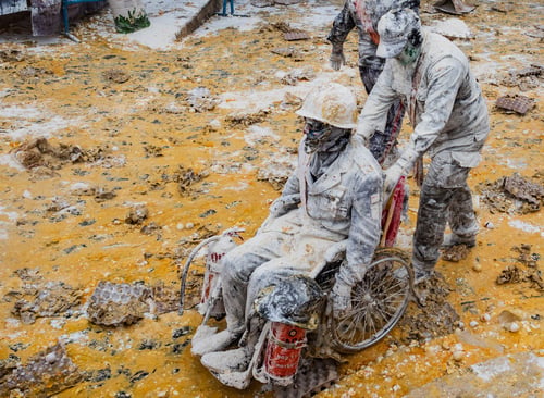 Preview: Ibi, Spain - December, 28 2018: People throwing eggs and flour at each other