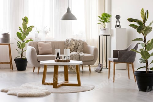 Preview: Beige sofa against window