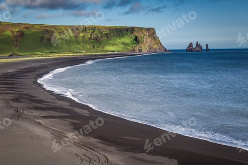 Preview: Cliffs and small bay in Iceland in summer