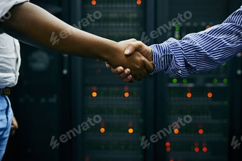 Preview: Paired up for professional IT service. Cropped shot of two men shaking hands in a data center.