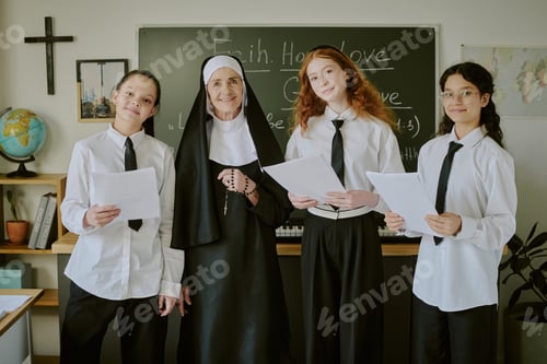 Preview: Portrait of Happy Nun with Multiracial Students in Classroom