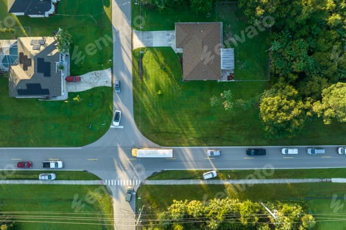 Preview: Aerial view of american yellow school bus picking up children at sidewalk bus stop