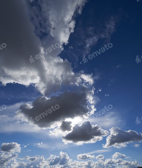 Preview: Sunshine lighting up the clouds. Beautiful cloudscape with sunbeams breaking through.
