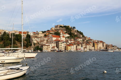 Preview: Beautiful shot of the sea and the buildings in Sibenik. Croatia