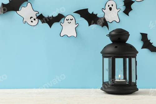 Preview: Lantern, paper ghosts and bats on blue background