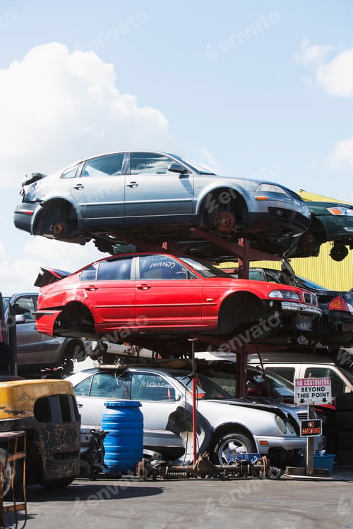 Preview: Cars stacked in scrap yard