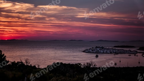 Preview: Beautiful orange and red sunset over sea.