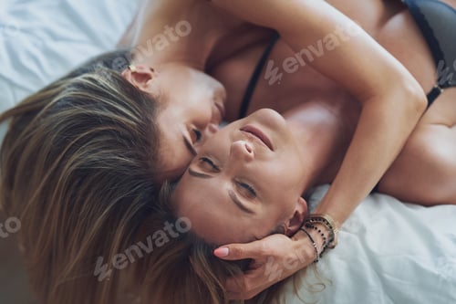 Preview: Two young girlfriends on the bed