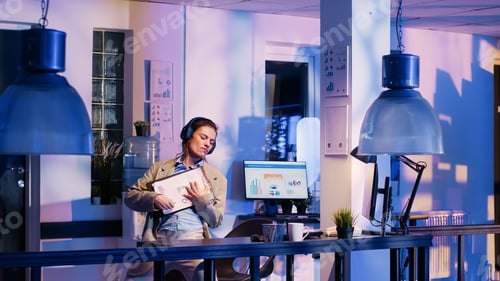 Preview: Happy advisor working on business report with headset