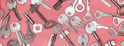 Preview: Keys set on pink background. Door lock keys and safes for proper