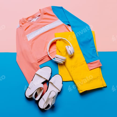 Preview: Stylish sports blouse and pants. Pastel trend. Sandals, earphone
