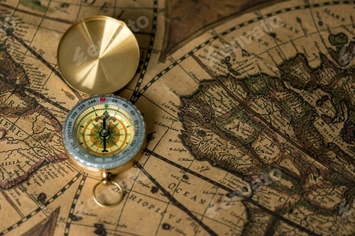 Preview: Old compass on vintage map