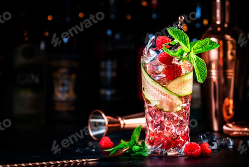 Preview: Rose garden cocktail drink with dry gin, tonic, syrup, lychee juice, lemon, raspberry, cucumber