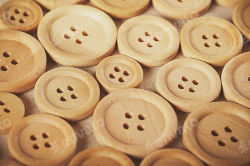 Preview: Wooden Buttons Lie On A White Background