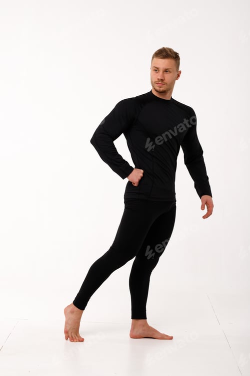 Preview: A man with a sporty physique in thermal underwear.