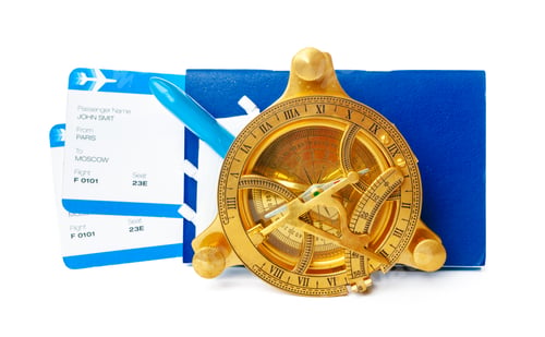 Preview: Flight tickets and compass isolated on white background close up