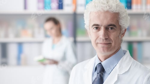 Preview: Confident doctor posing in his office