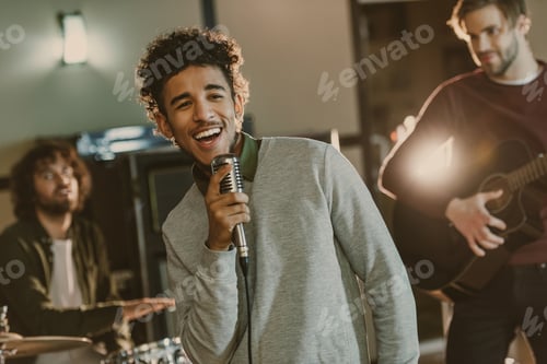 Preview: young happy rock band musicians performing song