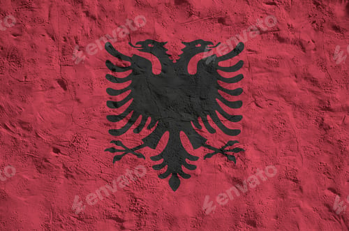 Preview: Albania flag depicted in bright paint colors on old relief plastering wall close up