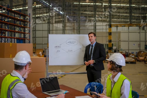 Preview: Blue collar workers are working and meeting at warehouse.