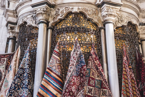 Preview: Handmade carpets sold and hunging on the wall at Asian street market, Tyrkey, Istanbul