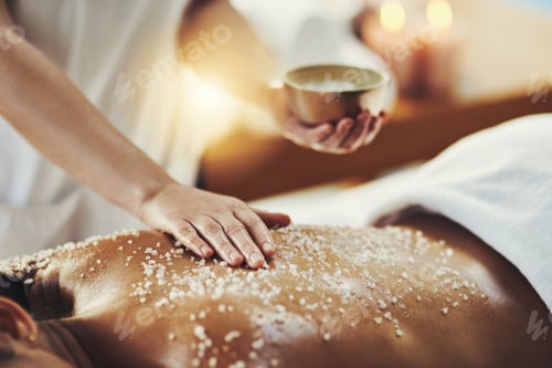 Preview: Closeup shot of a woman getting an exfoliating massage at a spa