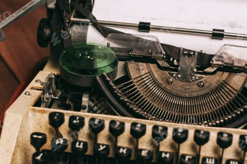 Preview: typewriter with keys letters paper wood background texture