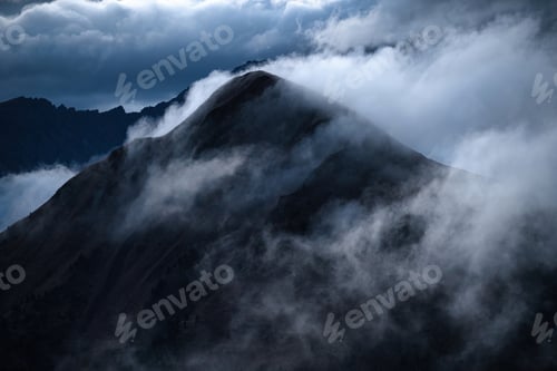 Preview: Dramatic Dolomites Mountains with clouds. Italy