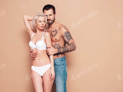 Preview: Beautiful woman and handsome man in studio
