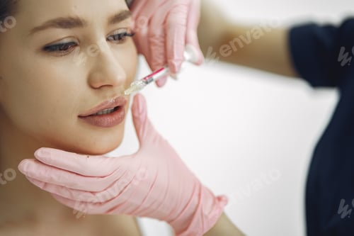 Preview: Woman with a doctor in cosmetology studio