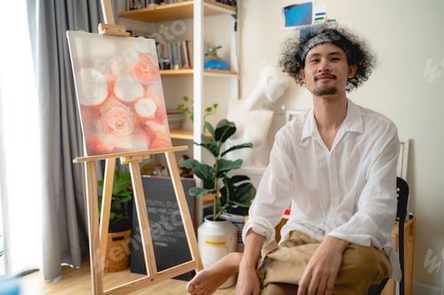Preview: young asian male person painting artist working in studio, art hobby lifestyle at home
