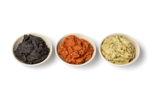 Preview: Bowls with fresh made Baba ganoush, Muhammara and black Hummus