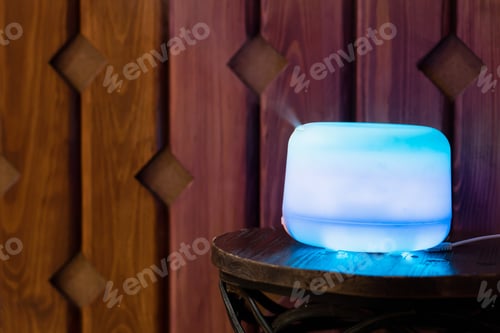 Preview: Working diffuser with night colorful light for aroma air with essential oils at home