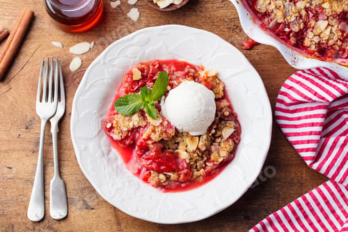 Preview: Crumble with berries and Fruits with Vanilla Ice Cream. Top view.