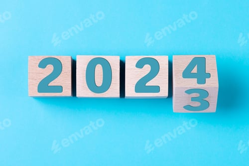 Visualização: Feliz Ano Novo de 2024. Bloco de cubos de madeira 2024 de 2023 a 2024 em azul. Conceito de Ano Novo 2024