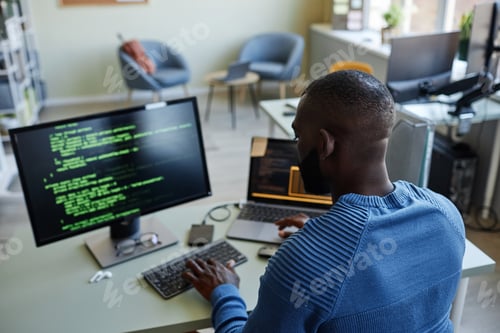 Preview: Software Developer Writing Code Back View