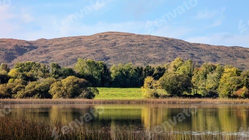 Preview: Beautiful morning lakeside landscape scenery, mountains reflected in Ross lake, county Galway, Irela