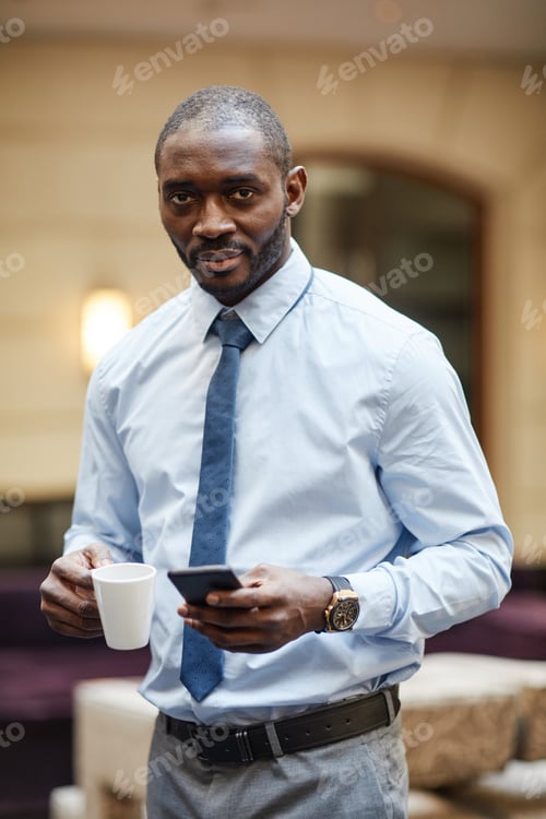 Preview: African-American Businessman Enjoying Coffee