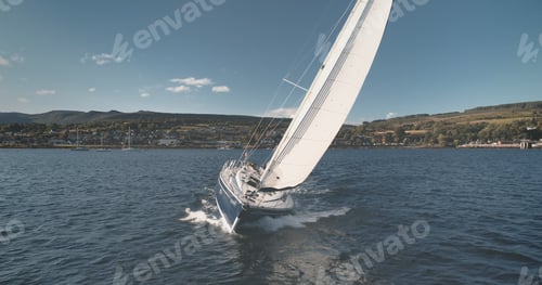 Preview: Yacht sailing at ocean bay aerial. Summer nobody nature seascape. Sailboat sun reflection. Port town