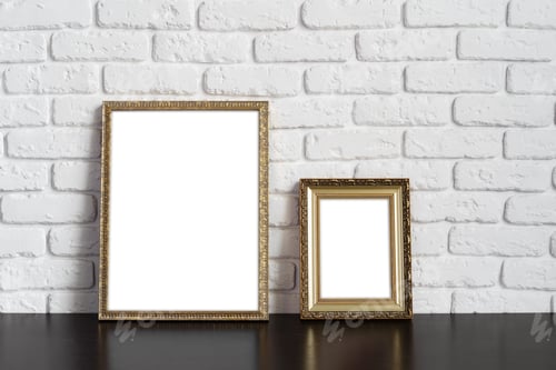 Preview: Blank picture frame against brick wall with copy space