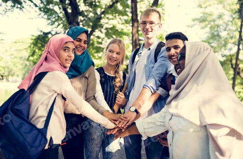 Preview: Group of diverse youth with teamwork joined hands