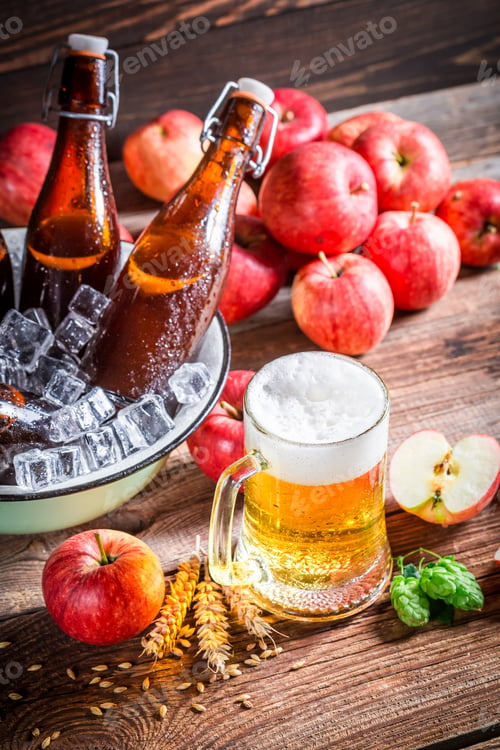 Preview: Cold and fresh cider beer with red apples