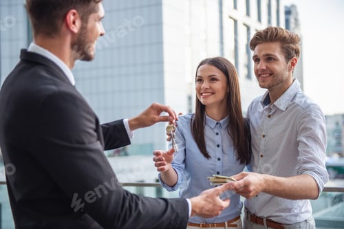 Preview: Handsome realtor and happy couple